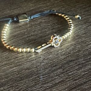 Adjustable beaded bracelet done in Italy.